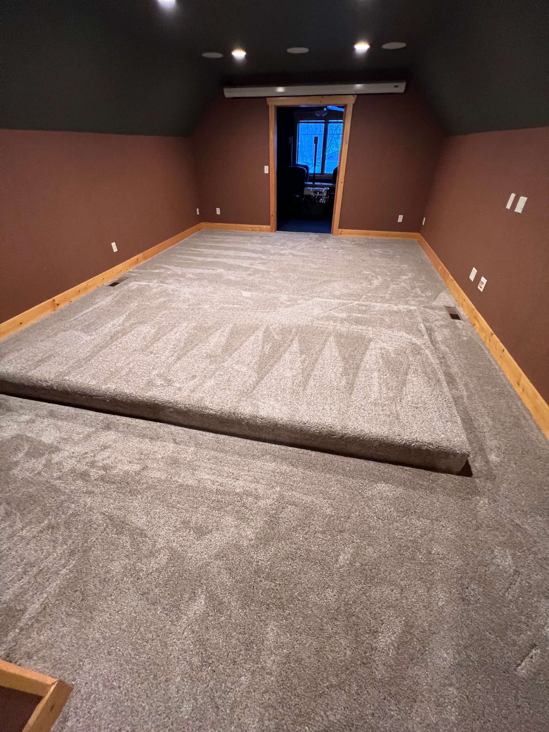 New carpet installed on a bedroom floor